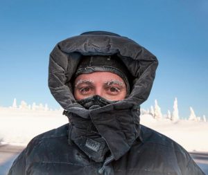 image:  Man in warm gear with frozen eyebrows